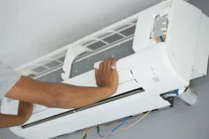 A technician performing AC Installation In Katy, TX.